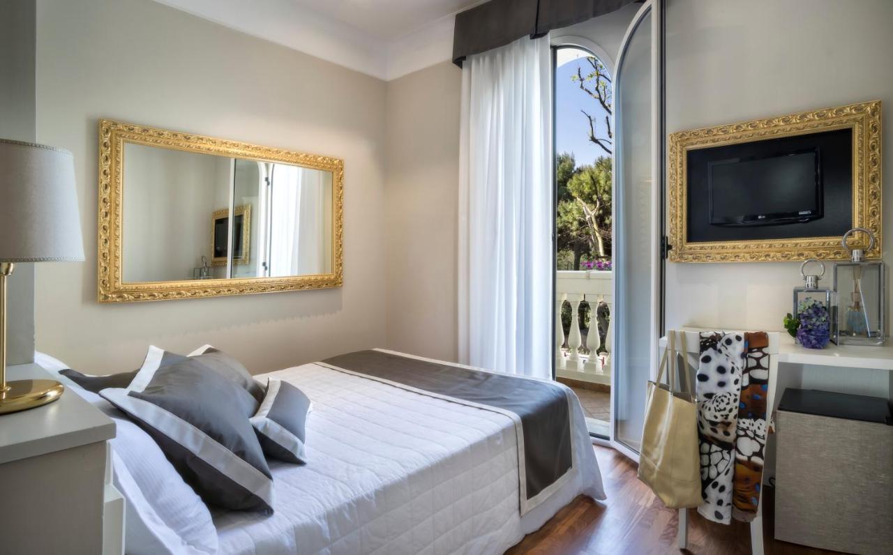 Novecento Suite Hotel Риччоне Экстерьер фото